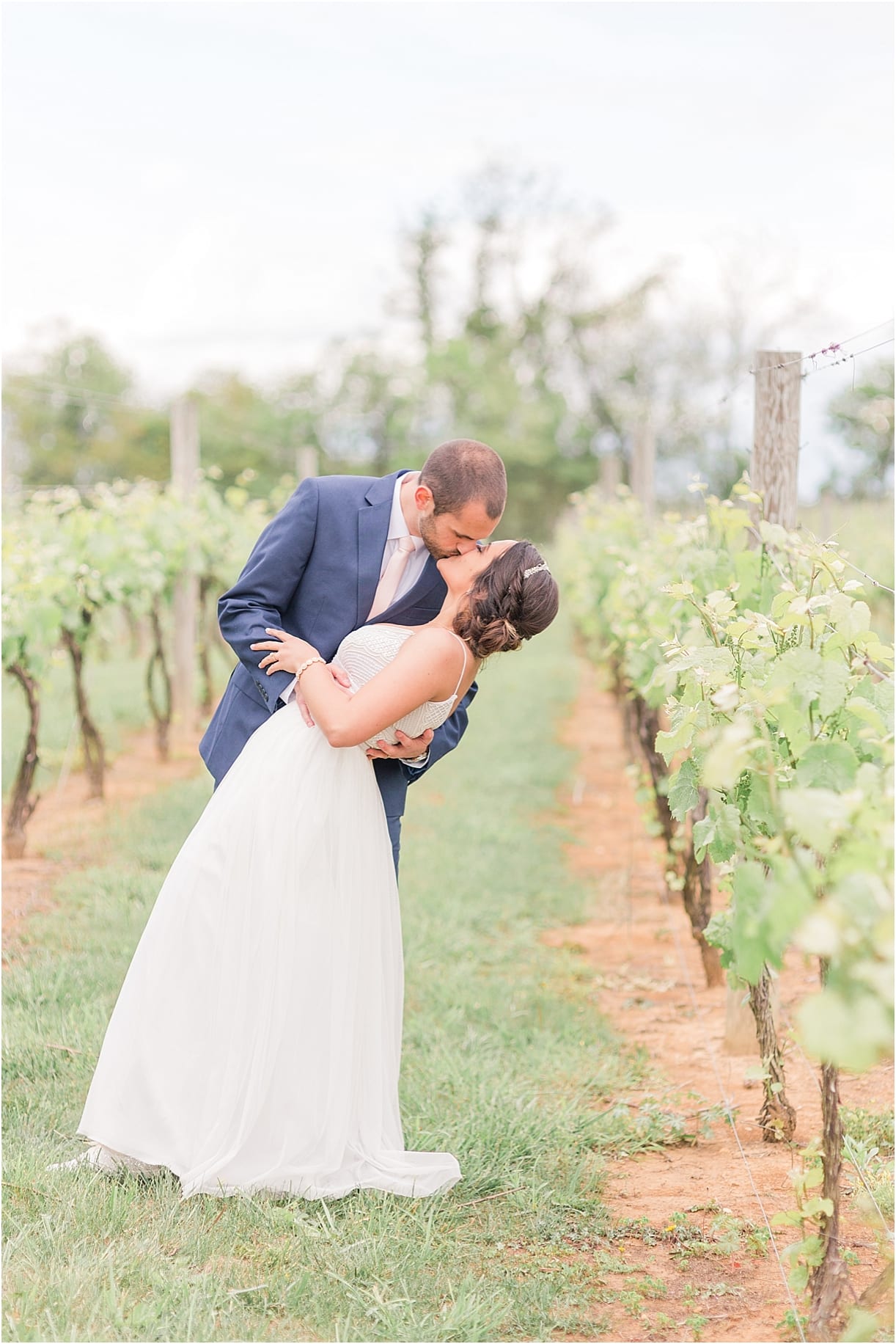 Spring Vineyard Wedding | Hill City Bride Virginia Wedding Blog - Jessica Green Photography - kiss groom