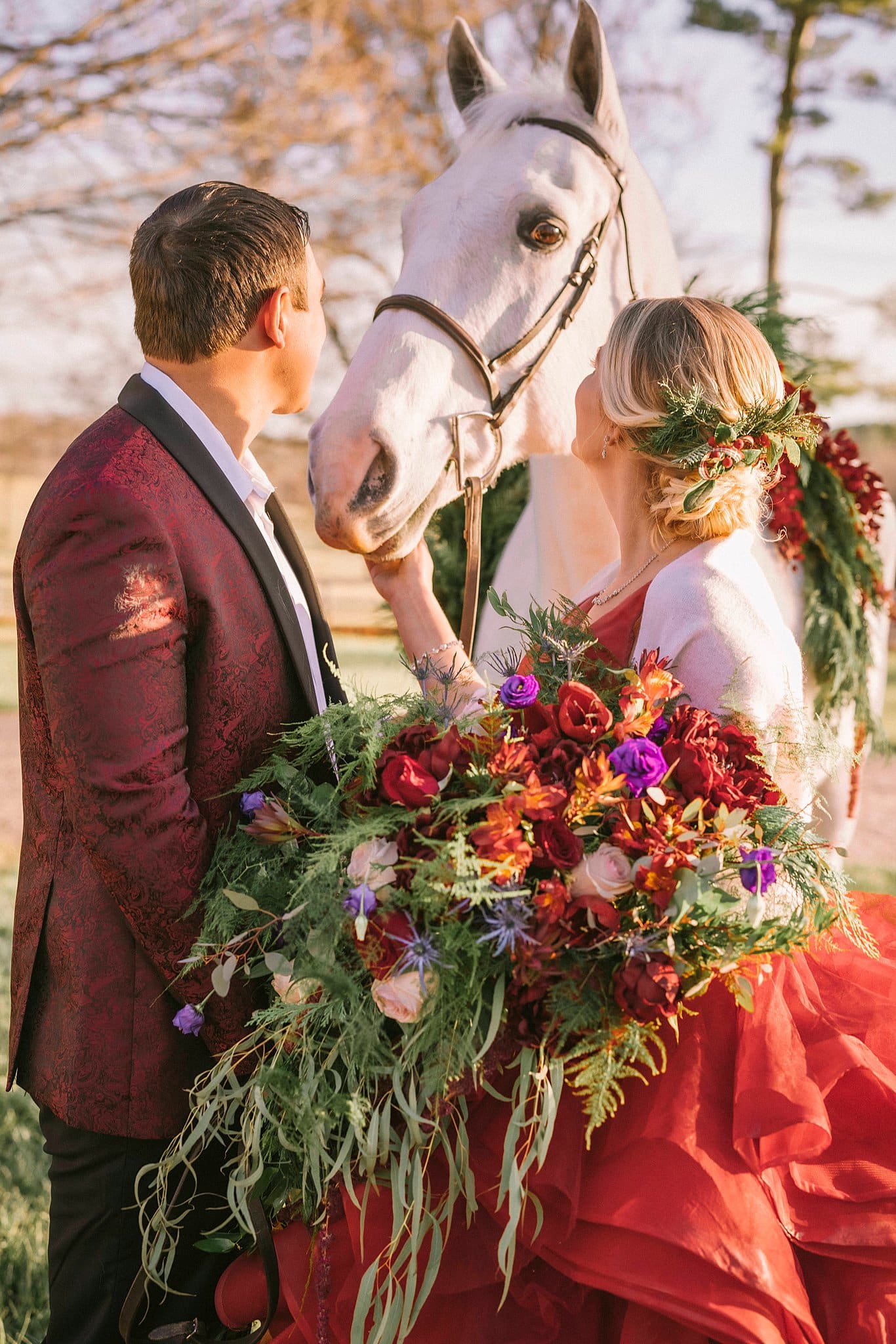 Couple with Horse at a Christmas Wedding