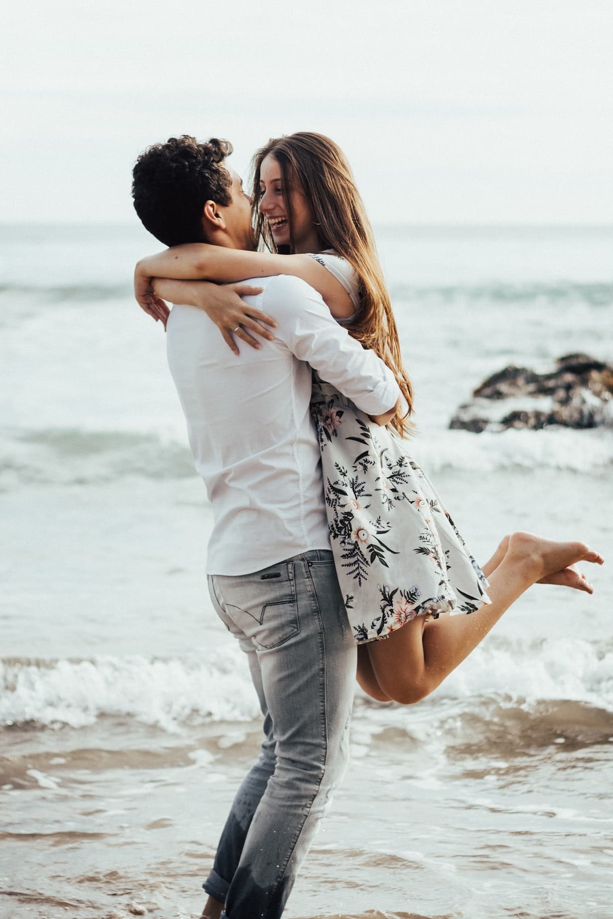Engaged Couple by Beach