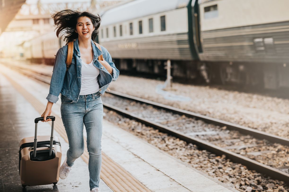 Woman Catching Train in Europe
